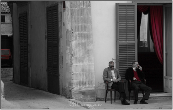 Sicilian men sitting outside in Ragusa Ibla