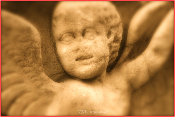 Winged Stone Sicilian Angel, copyright Jann Huizenga