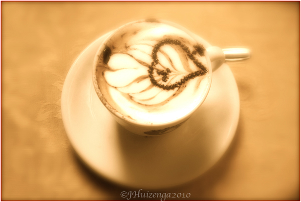 Cup of Cappuccino with Chocolate Heart on Foam, copyright Jann Huizenga