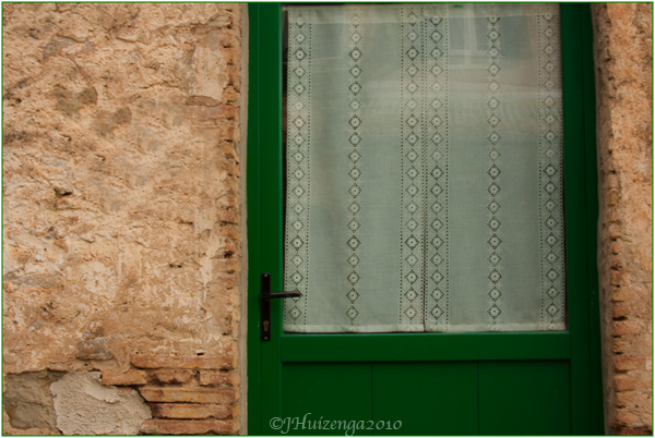 Sicilian Lace on Door, Sicily, copyright Jann Huizenga