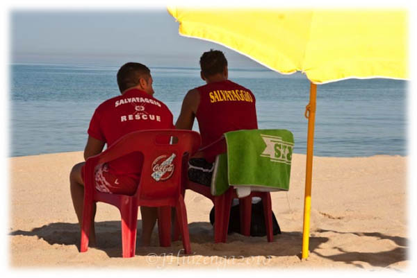 Sicilian Life Guards at Beach, copyright Jann Huizenga