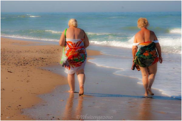 Two Women on Sicilian Beach, copyright Jann Huizenga