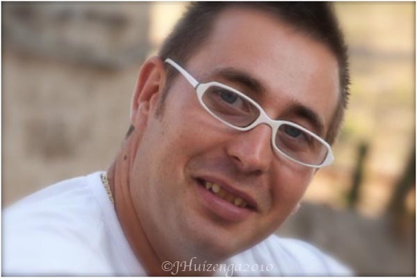 Sicilian Man in White Glasses, copyright Jann Huizenga