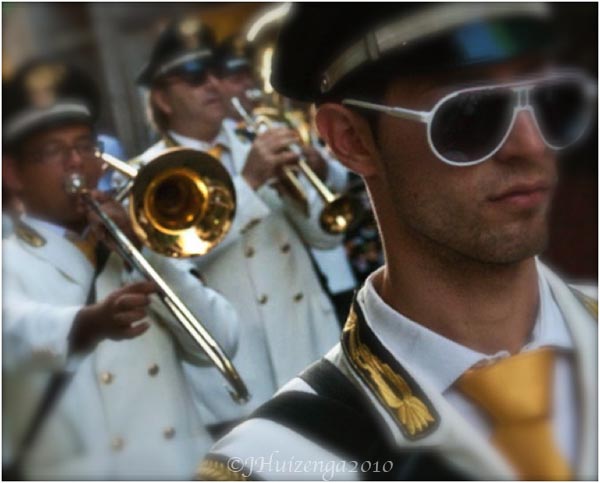 Sicilian Musician in White Sunglasses, copyright Jann Huizenga