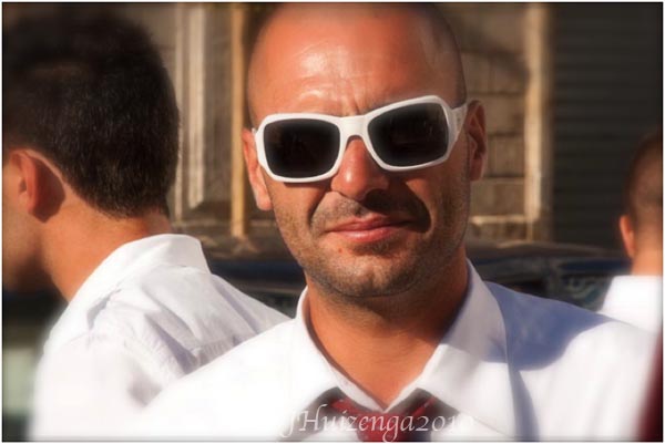 Sicilian Man in White Sunglasses, copyright Jann Huizenga