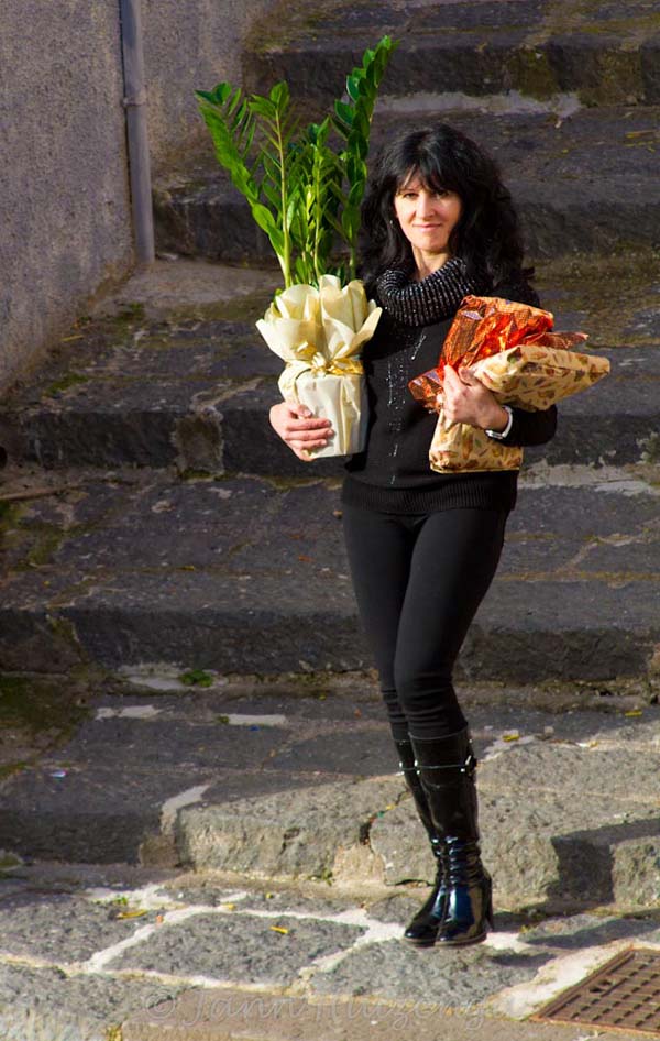 Sicilian Woman en route to Christmas Lunch, copyright Jann Huizenga