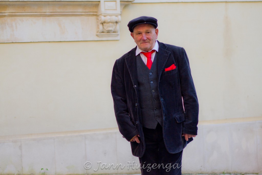 Sicilian Man in Red Tie, Scicli, Sicily, copyright Jann Huizenga