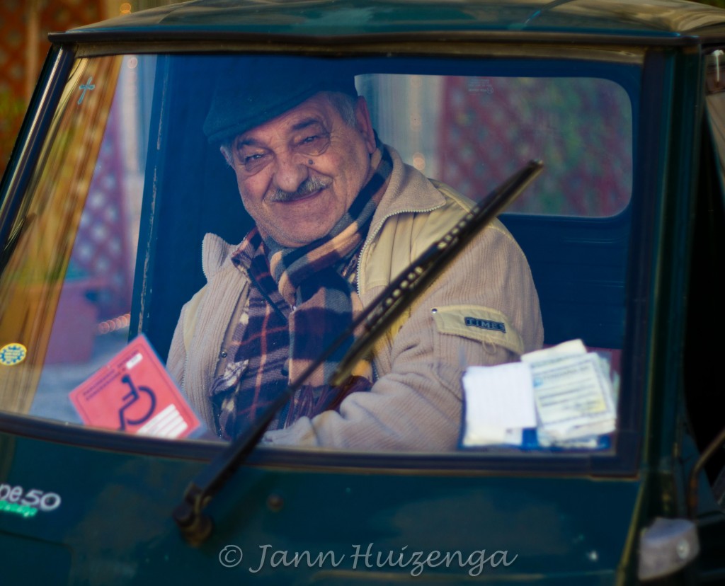 Sicilian Man in Little Truck (Ape), copyright Jann Huizenga