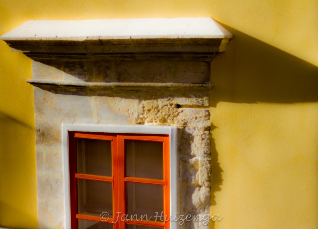Orange Window on Yellow Wall in Southeast Sicily, copyright Jann Huizenga
