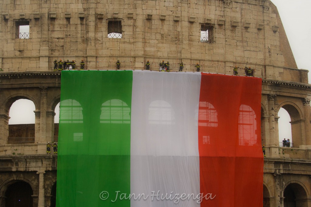 Italian Flag on Roman Colosseum, copyright Jann Huizenga