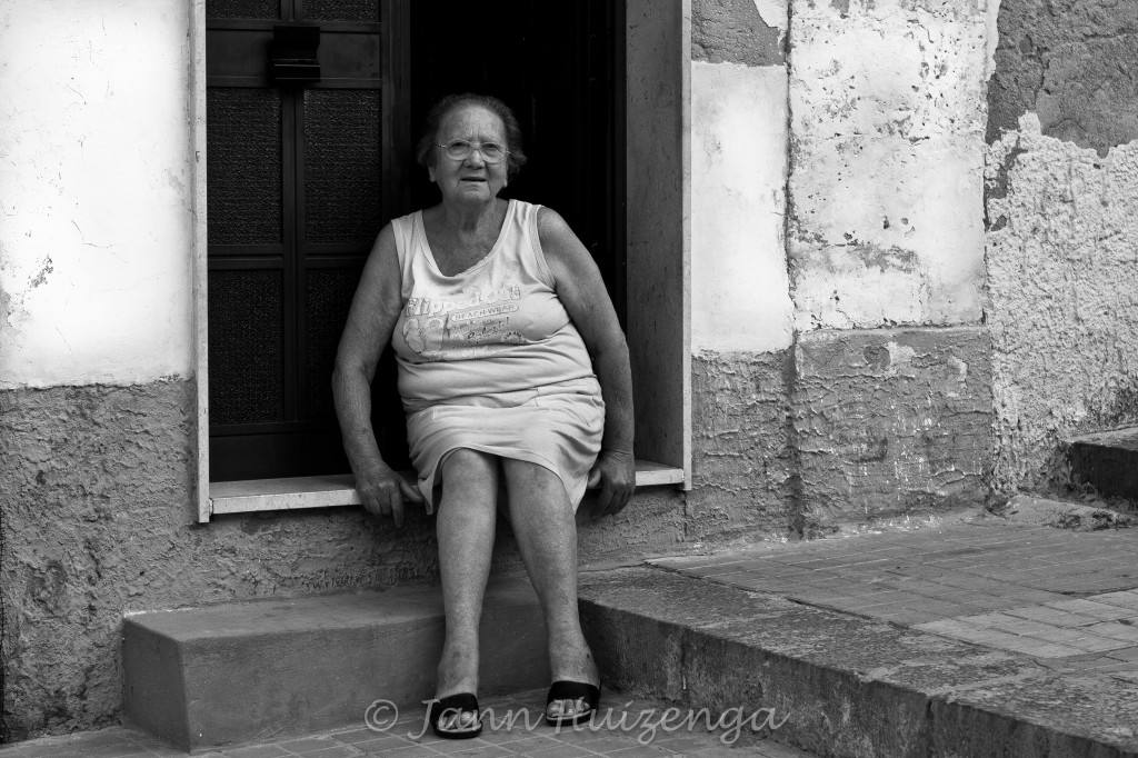 Summertime Stoop Sitter in Sicily, copyright Jann Huizenga
