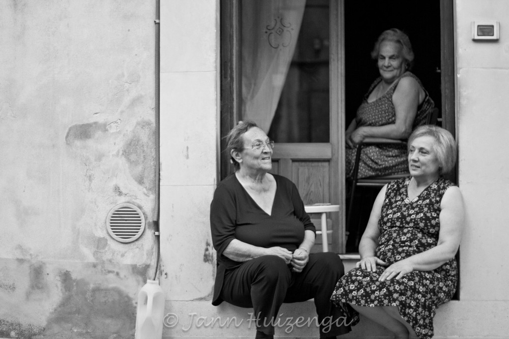 Summertime Stoop Sitters in Sicily, copyright Jann Huizenga