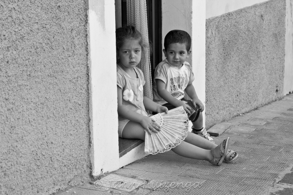 Summertime Stoop Sitters in Sicily, copyright Jann Huizenga
