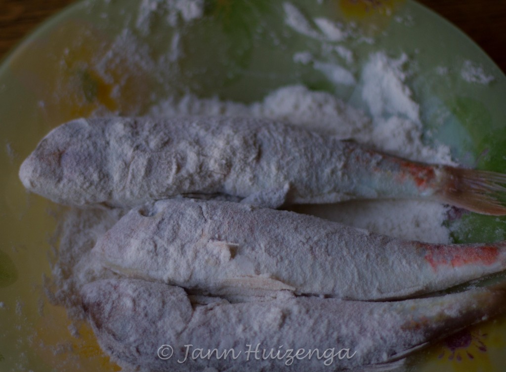 Fish dredged in flour; copyright Jann Huizenga