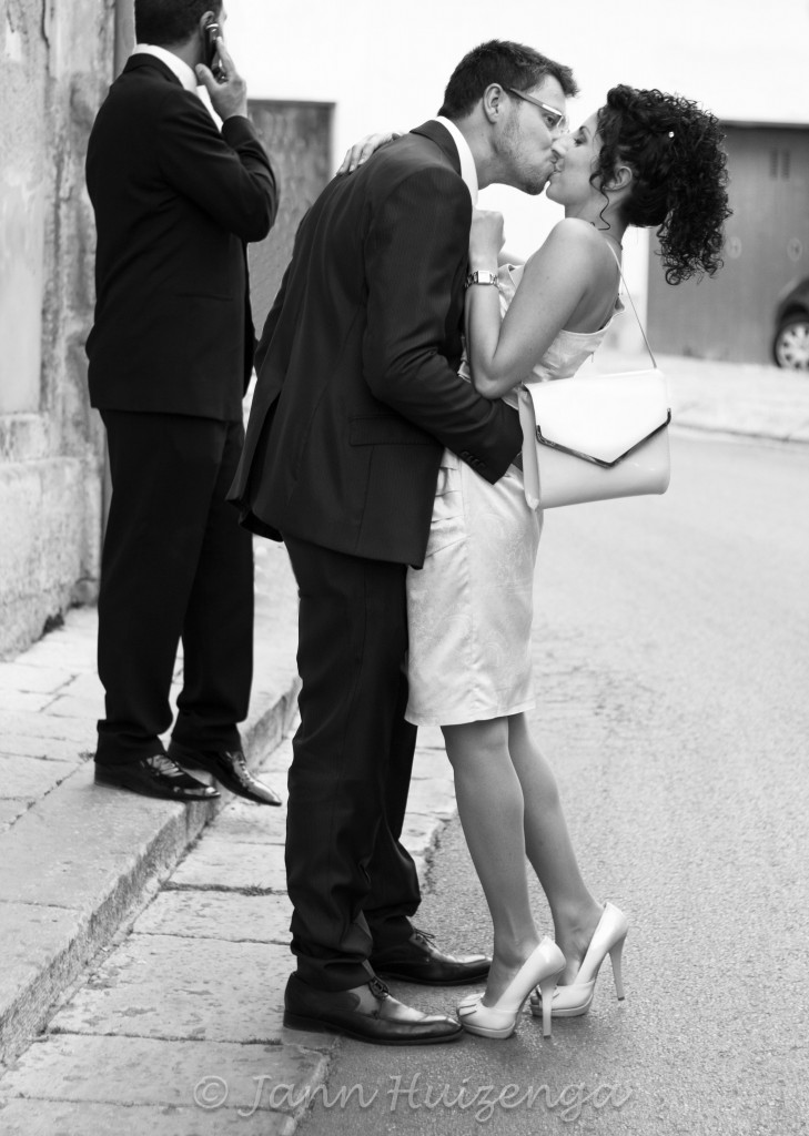 Couple Kissing in Sicily; copyright Jann Huizenga