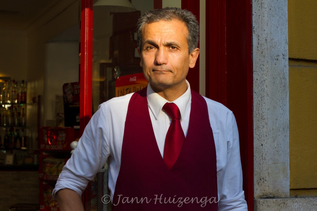 Waiter in Rome; copyright Jann Huizenga